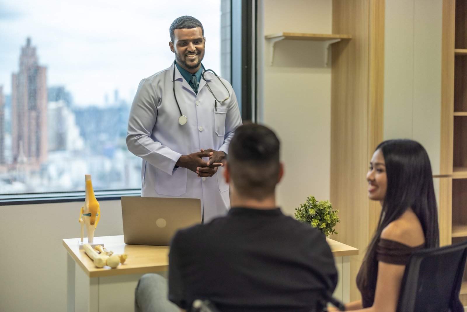 The orthopedic surgeon discussed the patient's MRI results, diagnosis, physical examination and upcoming surgical procedure. Emphasized rehabilitation and lifestyle changes for effective healing.